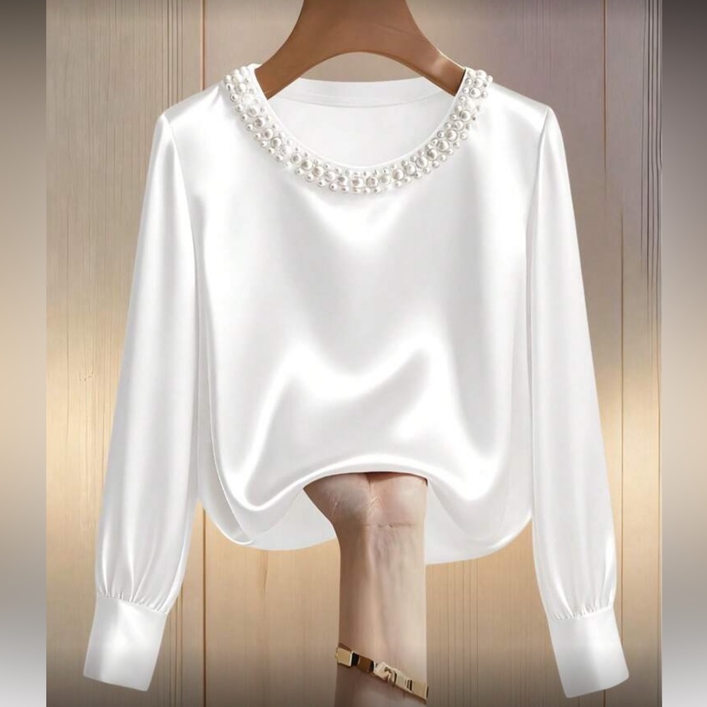 Elegant Pearl-Trim White Satin Blouse it did not fit me.
